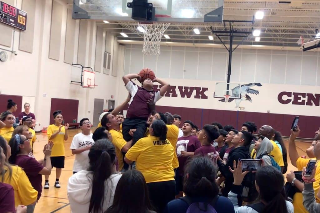 Tristan Garcia lifted up out of wheelchair to score first ever basket