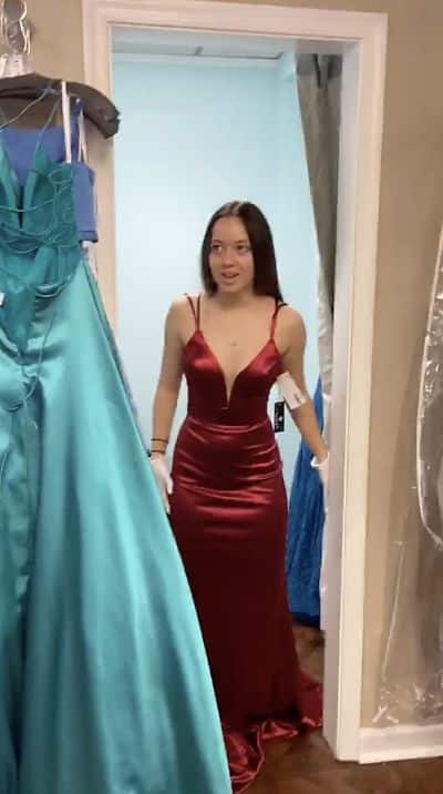 Marine surprises girlfriend at prom dress fitting