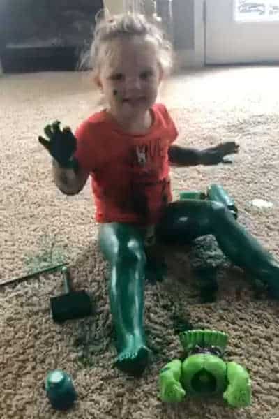 Girl paints herself green like incredible hulk