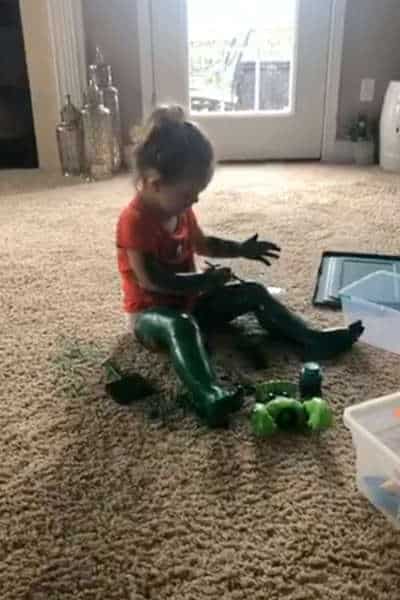 Girl paints herself green like incredible hulk