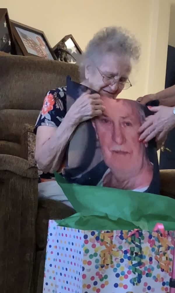 Grandmother surprised with memory pillow