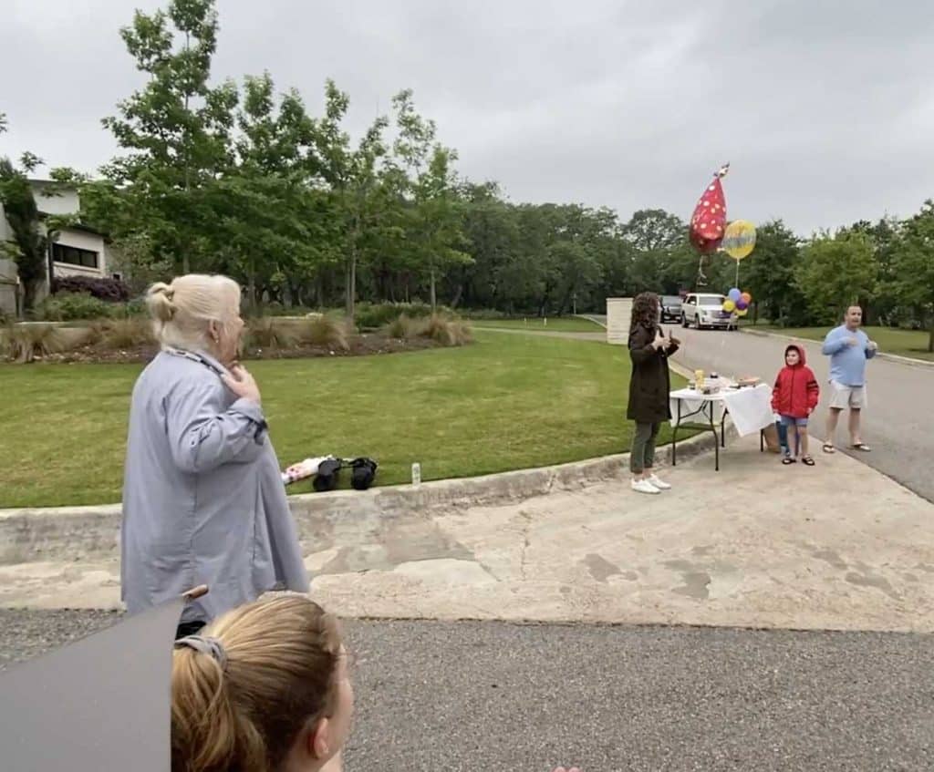 neighbors sign happy birthday to deaf boy