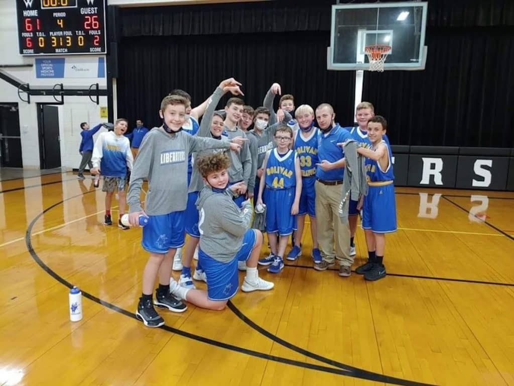 Landon and his basketball team the Bolivar Liberators