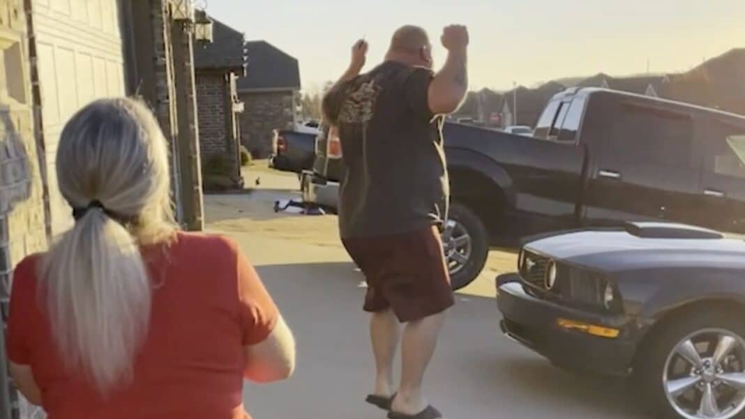 dad jumps for joy at mustang surprise