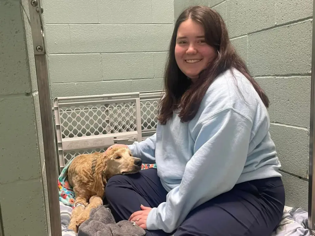 Emily snuggling with Acklin ahead of surgery.