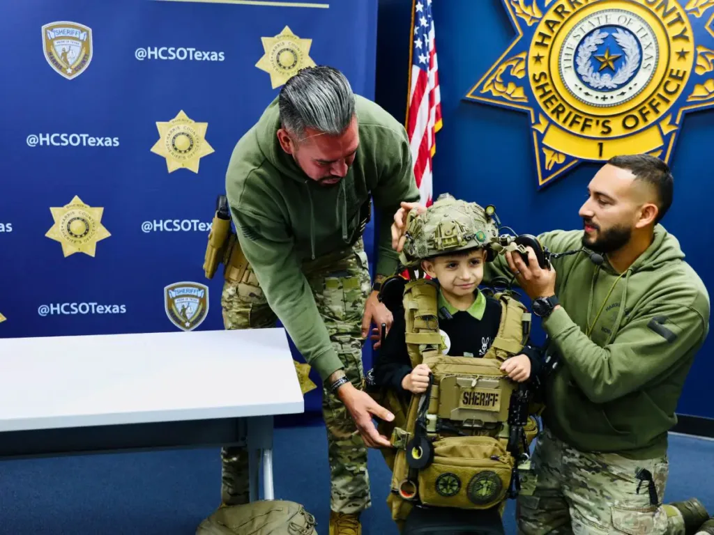 Romeo Gonzalez trying on SWAT gear.