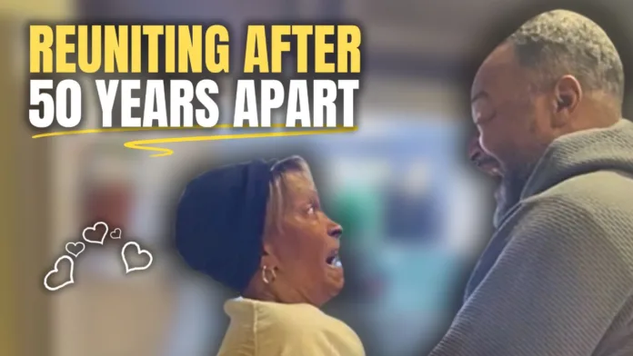 An older woman looks up with a shocked expression at a man smiling down at her, capturing their surprise reunion after decades apart.