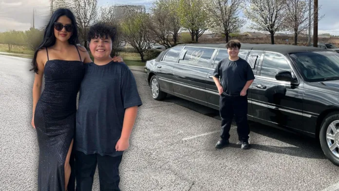 A smiling boy stands proudly next to his sister, who is dressed in a black gown, with a sleek black limousine behind them.
