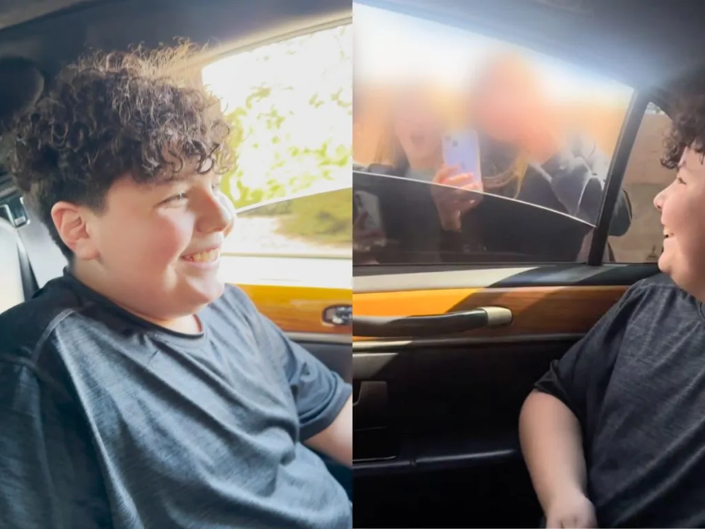 Inside the limo, a boy smiles joyfully as he sees classmates gathered outside, reacting with surprise and excitement.