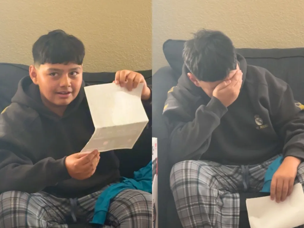 Split-screen shows a boy holding a paper gift on a couch, then wiping his face as he cries.