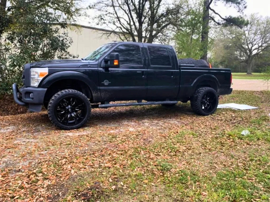 The black pick-up truck
