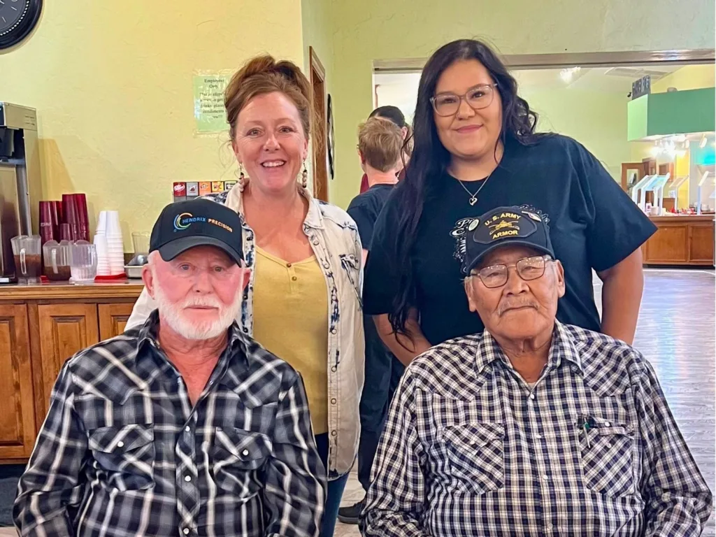 Melvin and Ronnie pose with Lindsey and Jen after their surprise reunion arranged by their daughters