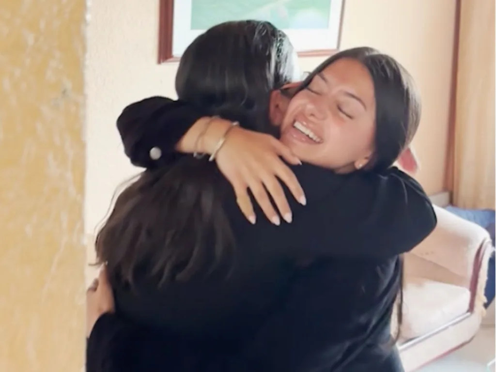 Mariana hugs Rachel during an emotional reunion in Colombia.