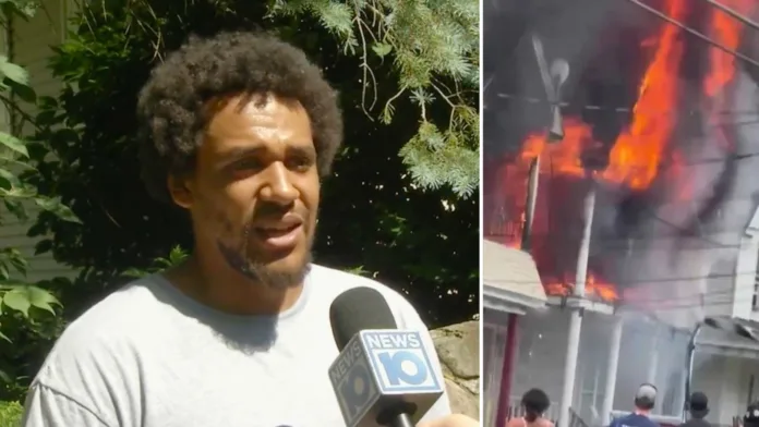 David Hester speaks to a NEWS10 ABC reporter after rescuing three people from a burning house in Schenectady, New York.