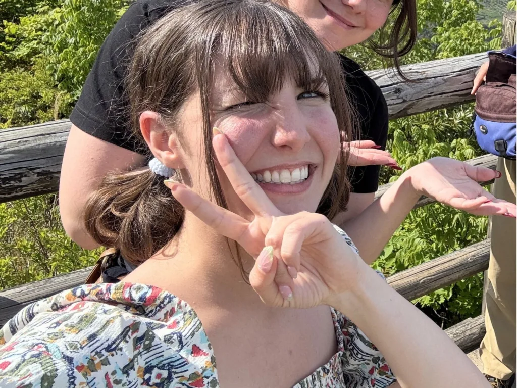 Laura smiling for a photo during her trip to Nakanoshima Island in Japan.